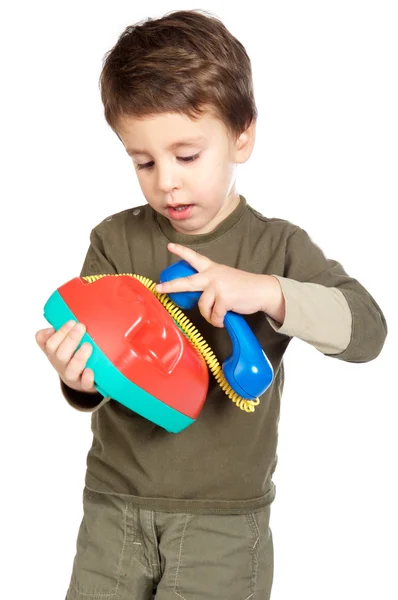Adorable boy speaking on the telephone — Stock Photo, Image