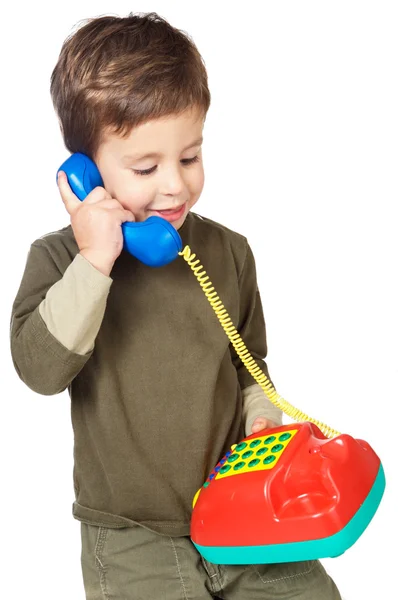 Αξιολάτρευτο παιδί μιλώντας στο τηλέφωνο — Φωτογραφία Αρχείου