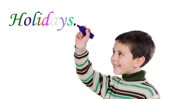 Adoráveis criança escrevendo a palavra "feriado " — Fotografia de Stock