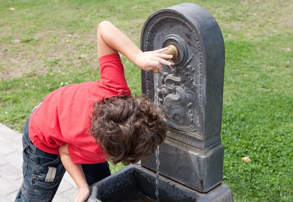 stock image Thirsty little boy