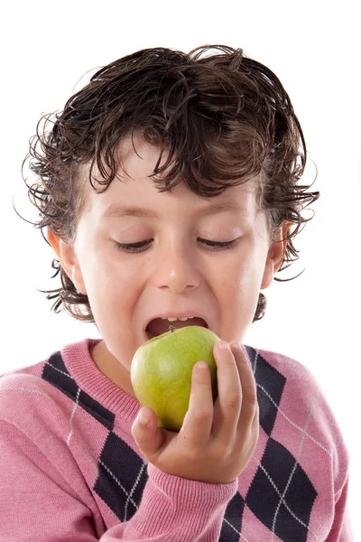 Barn biter ett äpple — Stockfoto