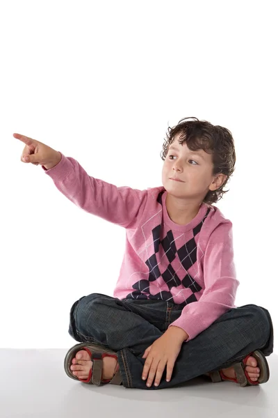 Criança bonita apontando com o dedo — Fotografia de Stock