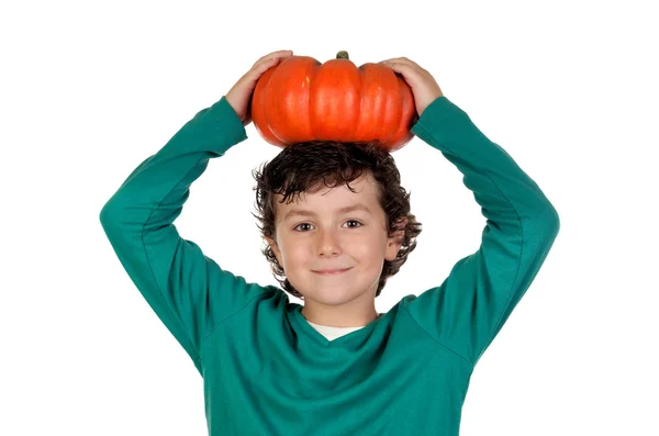 stock image Beautiful little boy with a big pumpkin