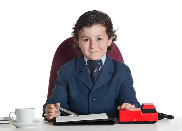Kleine zakenman in het kantoor — Stockfoto