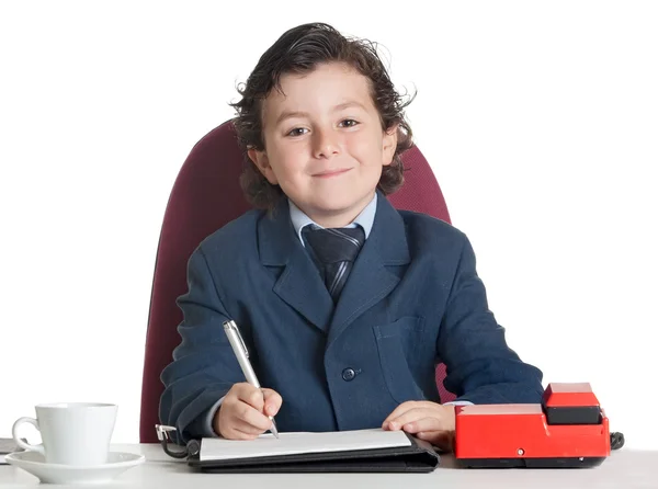 Маленький бизнесмен в офисе — стоковое фото