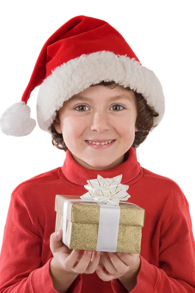 クリスマスと 1 つの贈り物の赤い帽子の愛らしい少年 — ストック写真