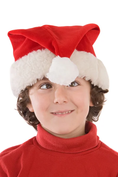 Garoto engraçado com chapéu vermelho de Natal — Fotografia de Stock