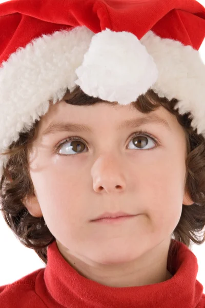Αστείος αγόρι με κόκκινο καπέλο των Χριστουγέννων — Φωτογραφία Αρχείου