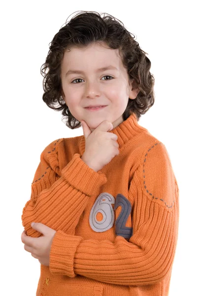 Nadenkende jongen met oranje kleding — Stockfoto
