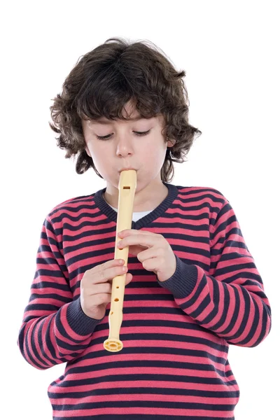 Criança adorável tocando flauta — Fotografia de Stock