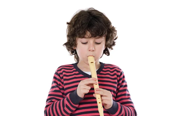 Чарівна дитина грає на флейті — стокове фото