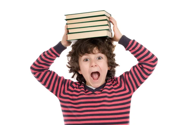 Niño adorable con muchos libros en la cabeza — Foto de Stock