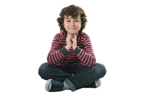 Rozkošný kavkazské chlapec sedí — Stock fotografie
