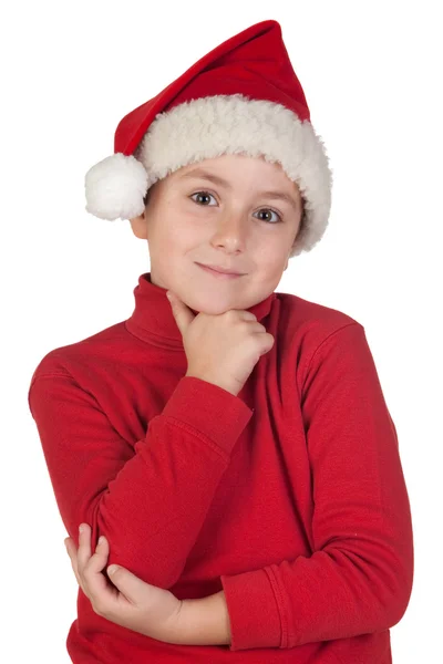 Entzückender Junge mit Weihnachtsmannhut — Stockfoto