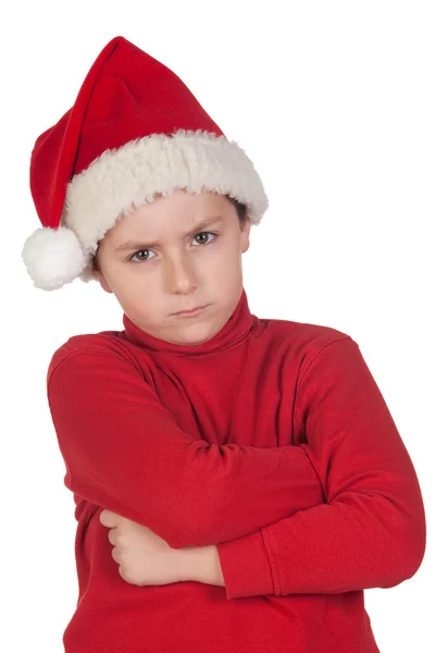 皱眉男孩与圣诞老人帽子 — 图库照片