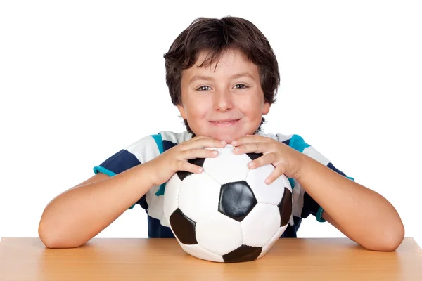 Menino adorável com uma bola de futebol — Fotografia de Stock