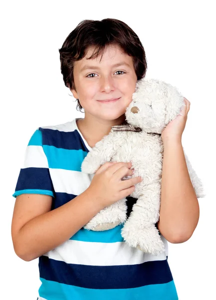 Adorable chico abrazando su osito de peluche — Foto de Stock