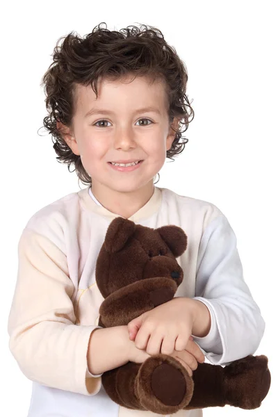 Hübscher Junge im Pyjama mit Teddybär — Stockfoto
