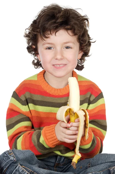 Παιδί που τρώει μια μπανάνα — Φωτογραφία Αρχείου