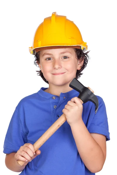 Schönes Kind mit gelbem Helm und Hammer — Stockfoto