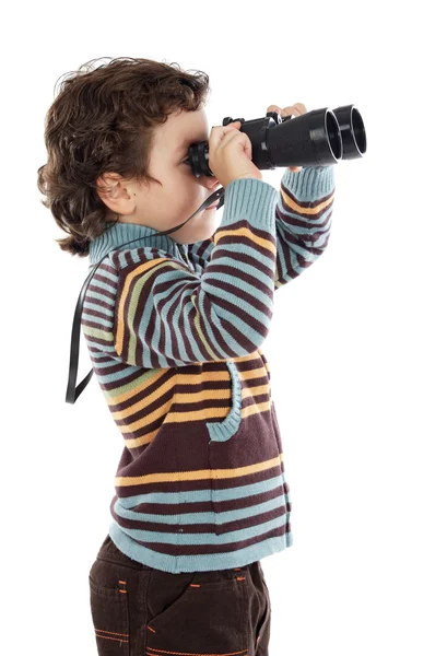 男孩在看后双筒望远镜 — 图库照片
