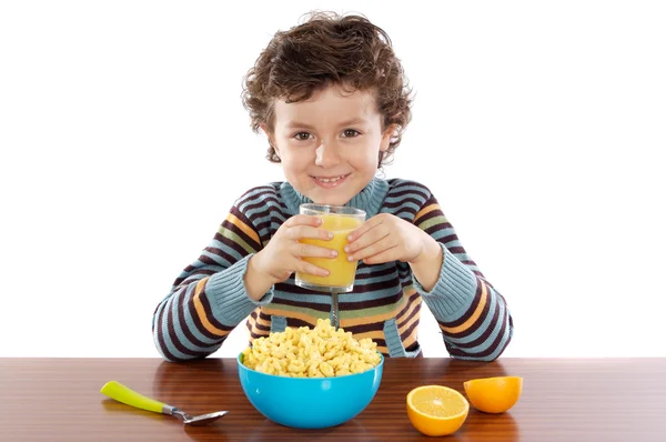 Child eating breakfast — Stock Photo, Image