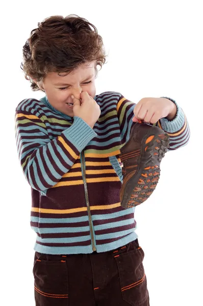 Boy with stinky shoe — Stock Photo, Image