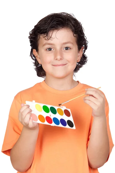 Criança agradável com aquarela e escova — Fotografia de Stock
