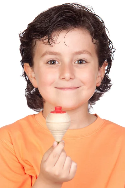 Nice child with wooden top to play — Stock Photo, Image