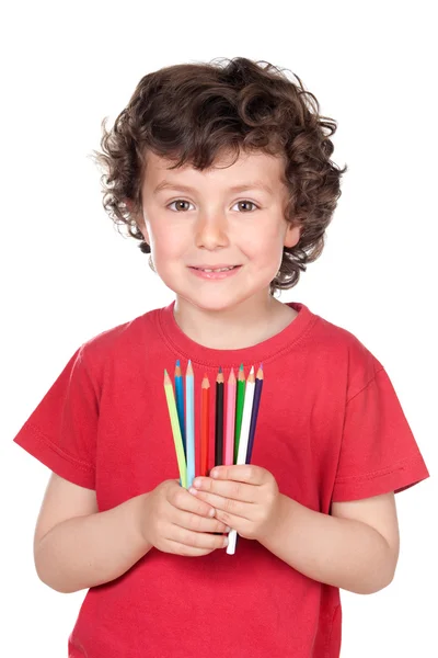 Schattige kleine jongen met veel kleurpotloden van kleuren — Stockfoto
