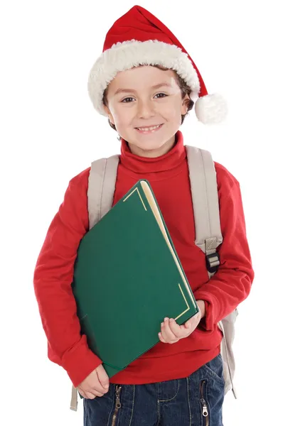 Barn studerar med jultomten hatt — Stockfoto