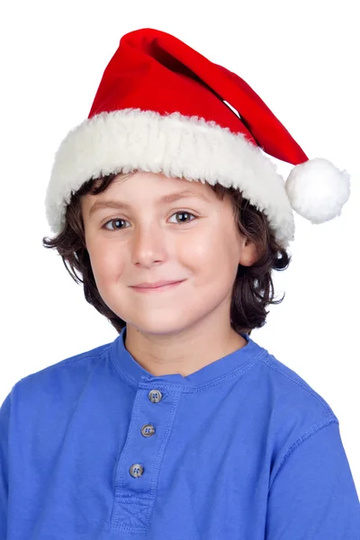 Lustiges Kind mit Weihnachtsmütze — Stockfoto