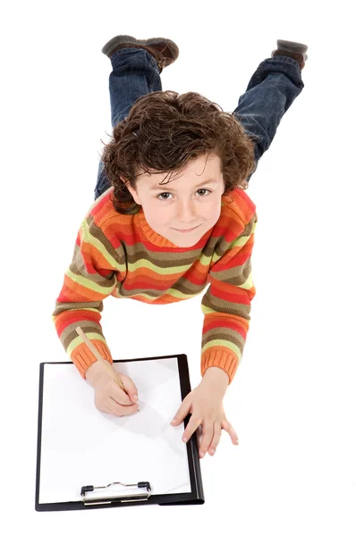 Boy write in clipboard — Stock Photo, Image
