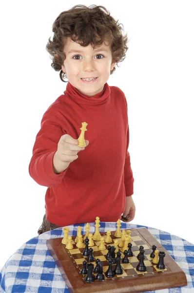 Adorable chico jugando al ajedrez — Foto de Stock