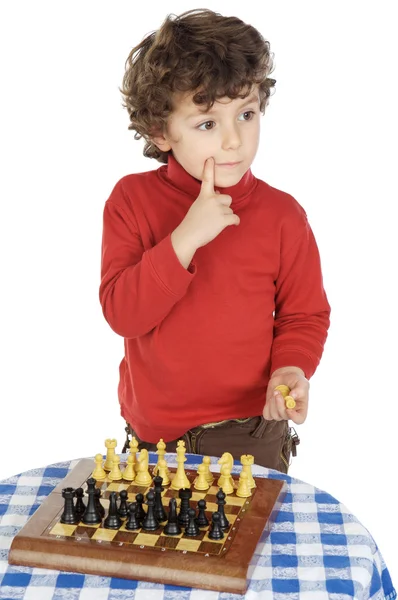 Adorable garçon jouant aux échecs — Photo