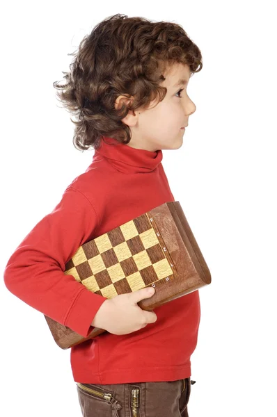 Adorable garçon jouant aux échecs — Photo