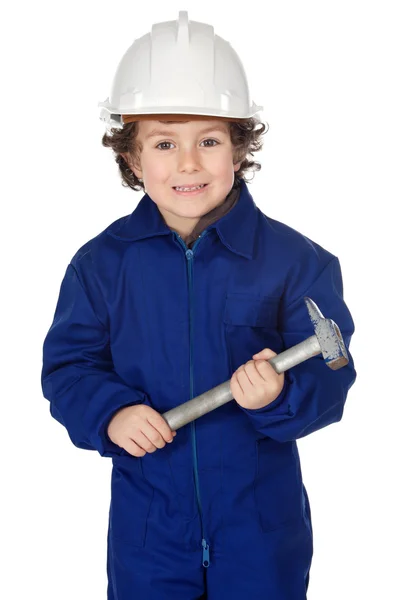 Αξιολάτρευτο παιδί ντυμένος εργαζόμενος σε ένα σφυρί και ένα κράνος — Φωτογραφία Αρχείου