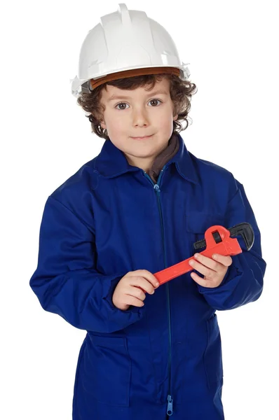 Adorável menino vestido trabalhador em um martelo e um capacete — Fotografia de Stock