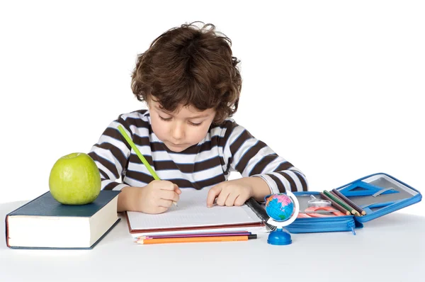 Adorable niño estudiando — Stok fotoğraf