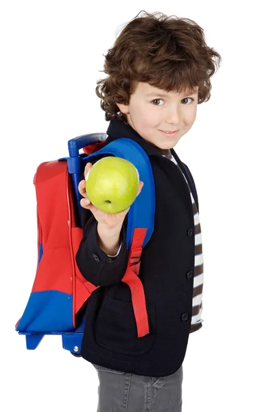 Rozkošný chlapec student s batohu a apple — Stock fotografie
