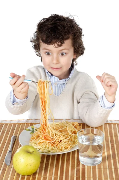 Adorable child hungry at the time of eating — Stock Photo, Image