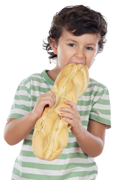 Ребенок ест хлеб — стоковое фото