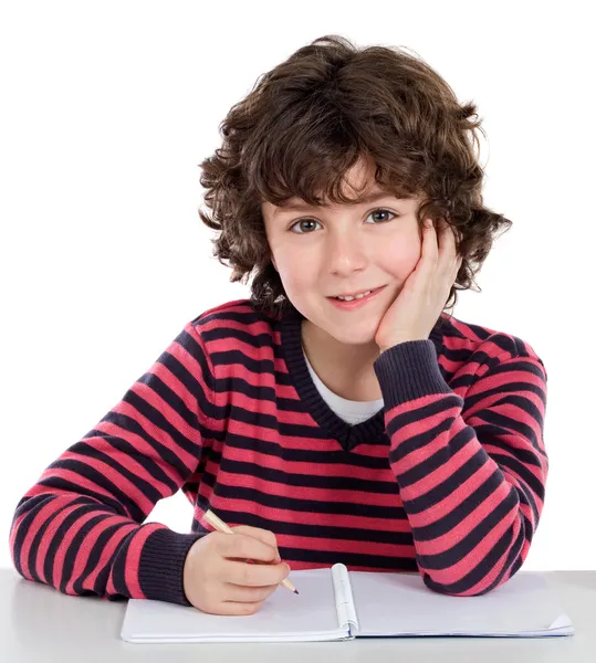 Adorabile bambino che scrive nella scuola — Foto Stock