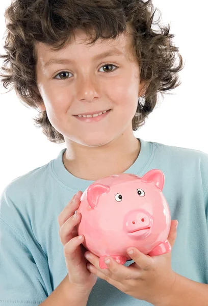 粉红猪存钱罐的可爱男孩 — 图库照片