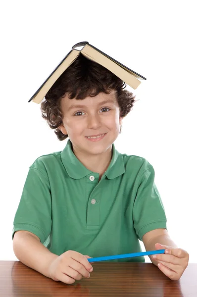 Adorable boy reading a book — Stock Photo, Image