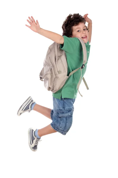Happy child jumping with backpack — Stock Photo, Image
