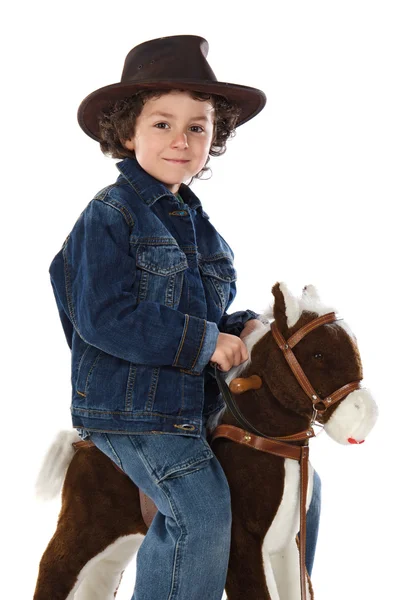 Çocuk tahtadan bir at üzerinde monte edilmiş. — Stok fotoğraf