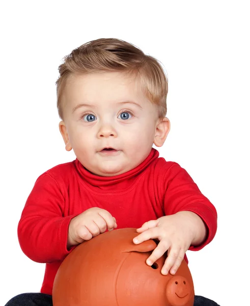 Hermoso bebé rubio con una alcancía —  Fotos de Stock