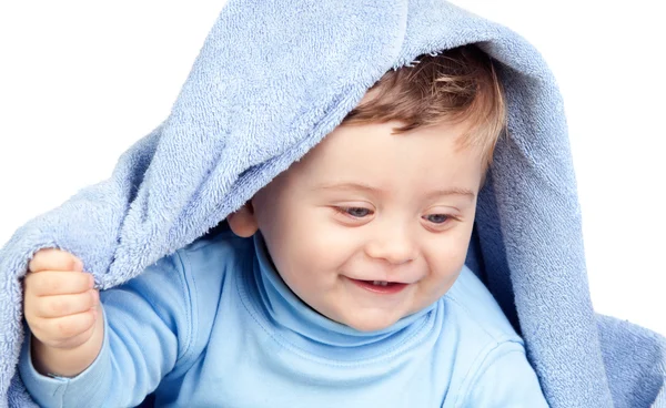 Beautiful blond baby with a towel — Stock Photo, Image