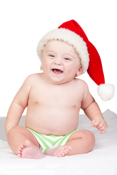 Bella bambina con gli occhi azzurri e cappello di Natale — Foto Stock